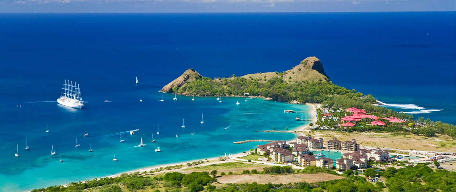 Saint Lucia captivates anyone who sets foot on its coastline. Always evocative, it welcomes visitors with its soothing waves, warm beaches, and hospitable people.