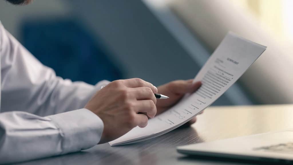 Business man going through documents